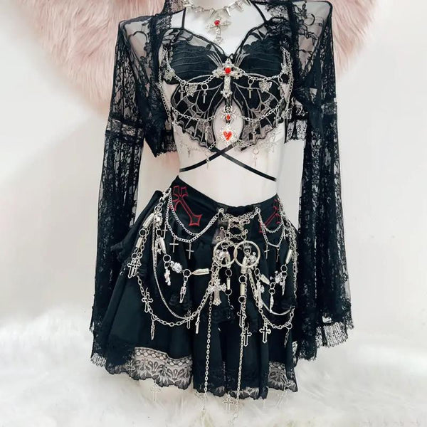 Ensemble mini-jupe à manches longues en dentelle et chaîne en métal à motif papillon 