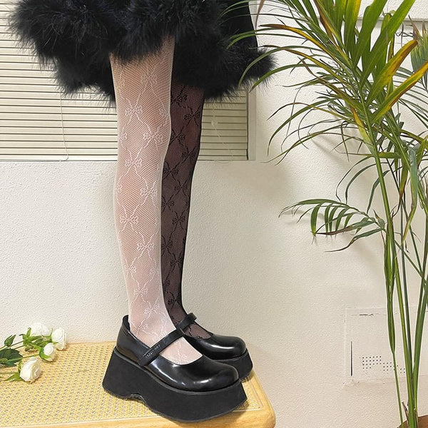 Collants nœud papillon en maille contrastée en dentelle 