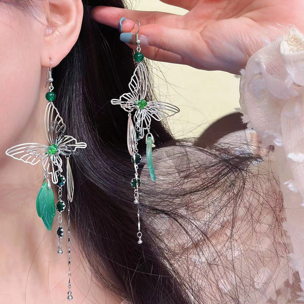 Boucles d'oreilles pendantes en strass vert avec pendentif papillon