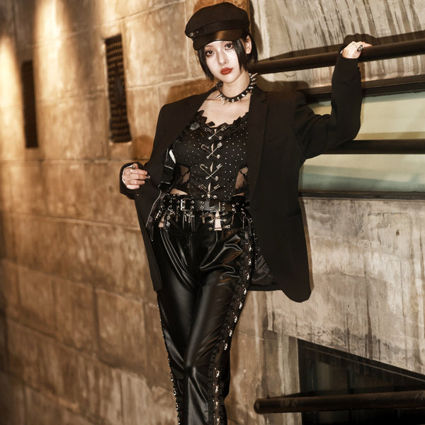 Pantalon en cuir PU avec anneau en O et applique tête de mort 