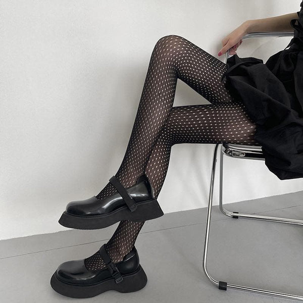 Collants unis ajourés en maille transparente 