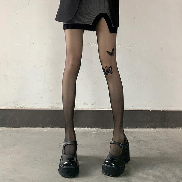 Collants unis en maille transparente à imprimé papillon 