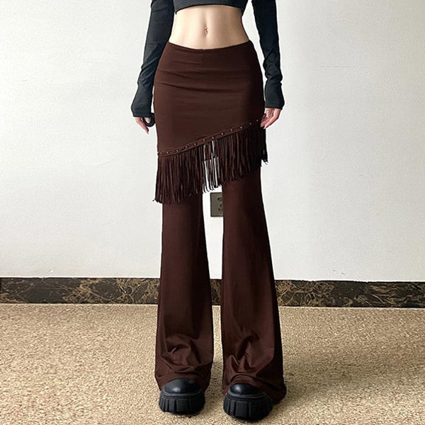 Pantalon taille basse patchwork à pompons rivetés 