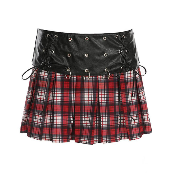 Mini-jupe plissée en cuir PU à carreaux avec appliques métalliques à nouer soi-même 