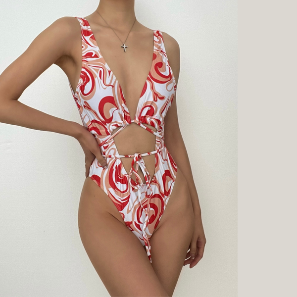 Maillot de bain une pièce à imprimé contrasté et décolleté plongeant, ajouré et à nouer soi-même 