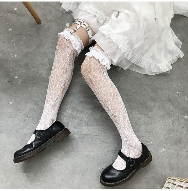 Chaussettes hautes en dentelle transparente 